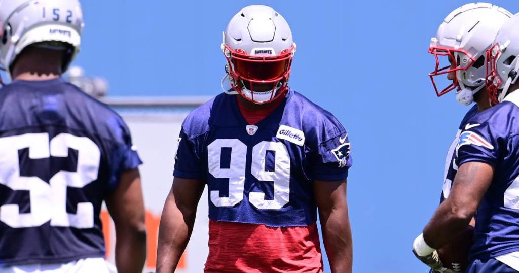 Jun 10, 2024; Foxborough, MA, USA; New England Patriots defensive end Keion White (99) works with the defense at minicamp at Gillette Stadium. Credit: Eric Canha-USA TODAY Sports