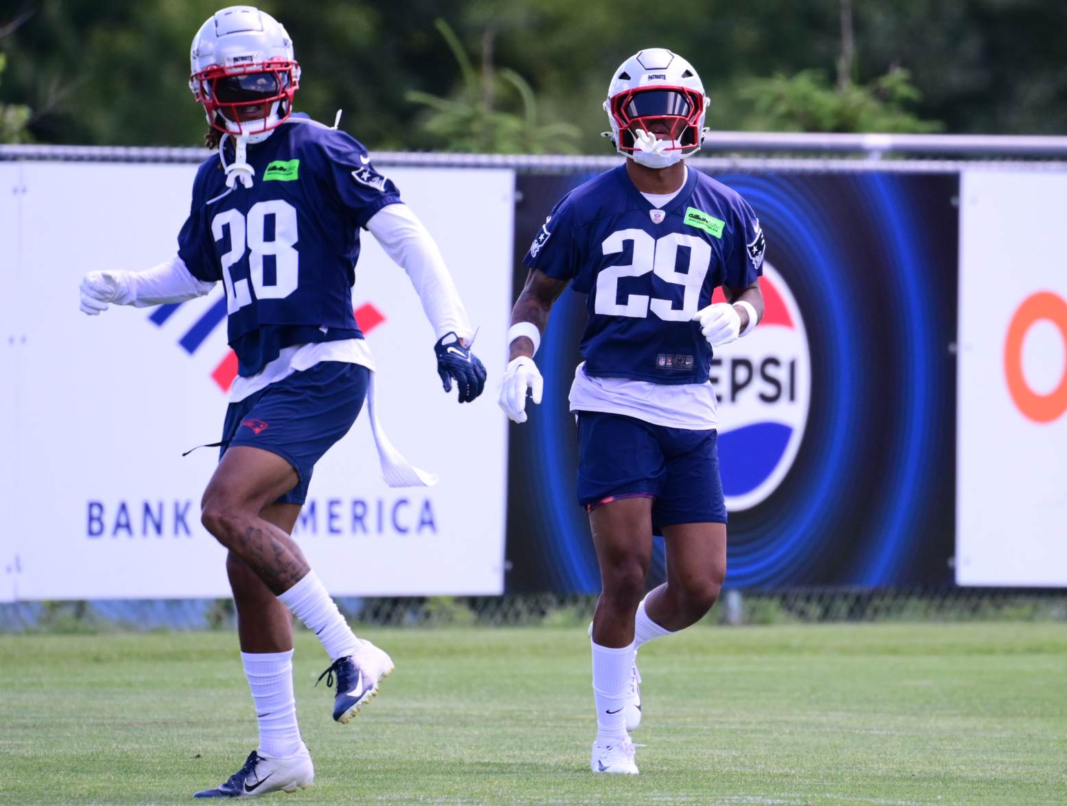 Jun 10, 2024; Foxborough, MA, USA; New England Patriots cornerback Isaiah Bolden (29) stretches before the start of minicamp at Gillette Stadium. Credit: Eric Canha-USA TODAY Sports