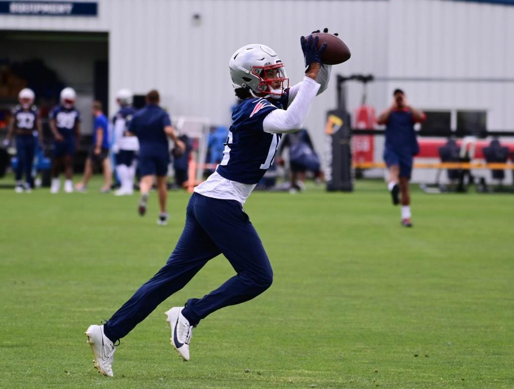 Jun 12, 2024; Foxborough, MA, USA; New England Patriots safety Marte Mapu (15) makes a catch at minicamp at Gillette Stadium. Credit: Eric Canha-USA TODAY Sports