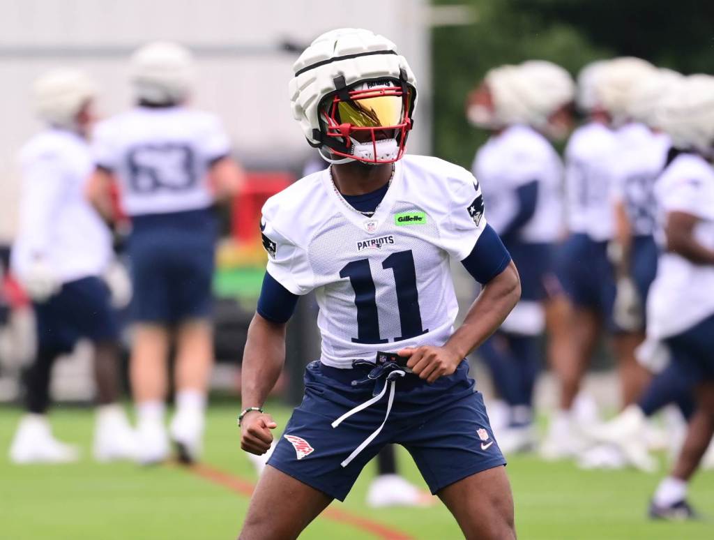 Jul 24, 2024; Foxborough, MA, USA; New England Patriots wide receiver Tyquan Thornton (11) stretches during training camp at Gillette Stadium. Credit: Eric Canha-USA TODAY Sports