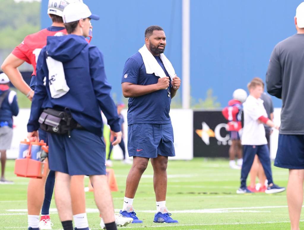 Jul 24, 2024; Foxborough, MA, USA; New England Patriots head coach Jerod Mayo watches over practice during training camp at Gillette Stadium. Credit: Eric Canha-USA TODAY Sports