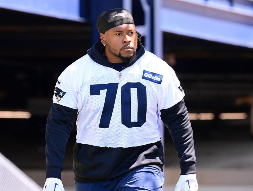 Patriots offensive line coach Scott Peters said rookie tackle Caedan Wallace (pictured above) has 'done well' at Patriots training camp so far.