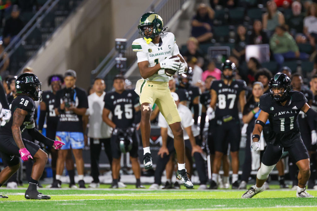 HONOLULU, HAWAII - NOVEMBER 25: Tory Horton #14 of the Colorado State Rams leaps and comes down with a pass during the first half of their game against the Hawaii Rainbow Warriors at Clarence T.C. Ching Athletics Complex on November 25, 2023 in Honolulu, Hawaii. (Photo by Darryl Oumi/Getty Images)