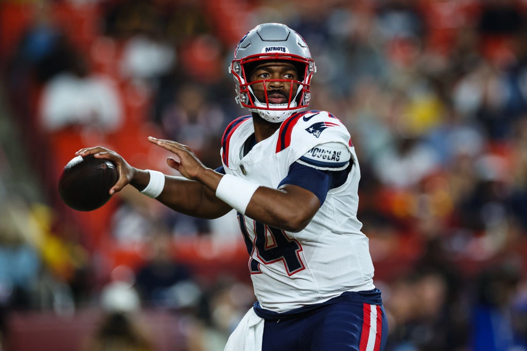 LANDOVER, MD - AUGUST 25: Jacoby Brissett #14 of the New England Patriots looks to pass against the Washington Commanders in the first quarter of a preseason game at Commanders Field on August 25, 2024 in Landover, Maryland. (Photo by Scott Taetsch/Getty Images)