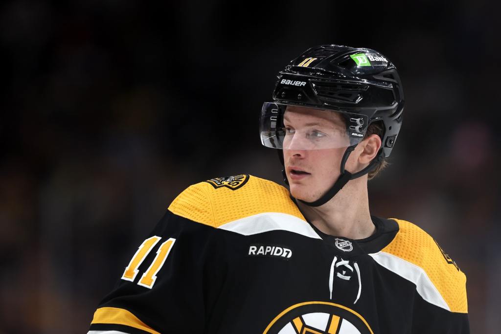 BOSTON, MASSACHUSETTS - APRIL 11: Trent Frederic #11 of the Boston Bruins looks on during the third period against the Washington Capitals at TD Garden on April 11, 2023 in Boston, Massachusetts. The Bruins defeat the Capitals 5-2, setting the new NHL record for most points in a single season with 133. (Photo by Maddie Meyer/Getty Images)