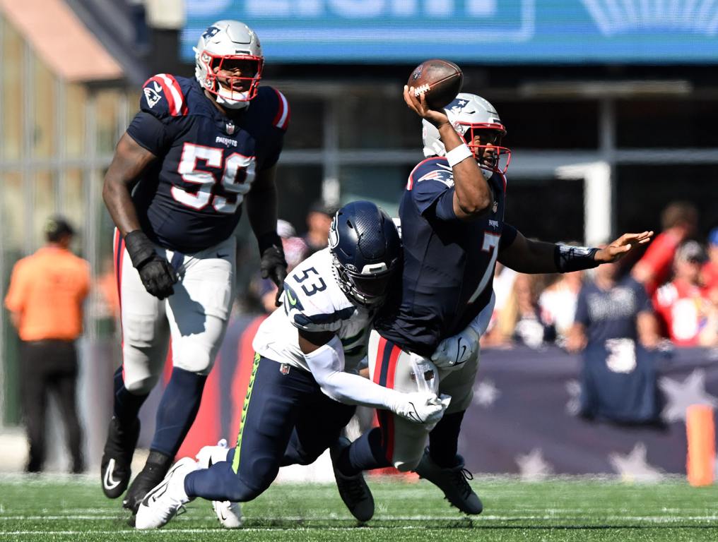 Sep 15, 2024; Foxborough, Massachusetts, USA;  Seattle Seahawks linebacker Boye Mafe (53) sacks New England Patriots quarterback Jacoby Brissett (7) during the second half at Gillette Stadium. Mandatory Credit: Brian Fluharty-Imagn Images