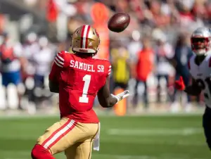 Sep 29, 2024; Santa Clara, California, USA; San Francisco 49ers wide receiver Deebo Samuel Sr. (1) catches a pass for the first down against the New England Patriots during the third quarter at Levi's Stadium. Credit: Neville E. Guard-Imagn Images