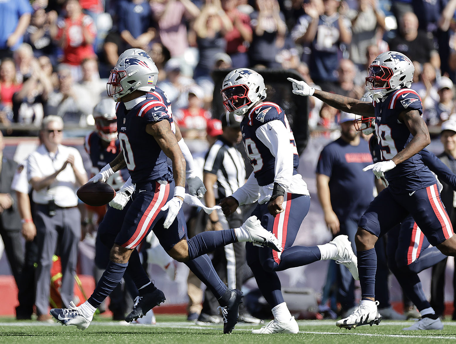 FOXBOROUGH, MASSACHUSETTS - OCTOBER 06: Christian Gonzalez #0 of the New England Patriots celebrates a interception during the first quarter against the Miami Dolphins at Gillette Stadium on October 06, 2024 in Foxborough, Massachusetts. (Photo by Adam Hunger/Getty Images)