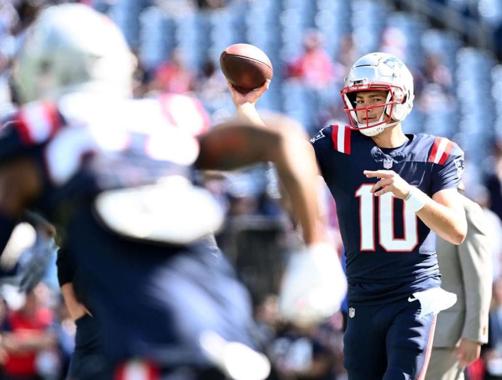 Oct 6, 2024; Foxborough, Massachusetts, USA; New England Patriots quarterback Drake Maye (10) throw the ball before a game against the Miami Dolphins at Gillette Stadium. Mandatory Credit: Brian Fluharty-Imagn Images