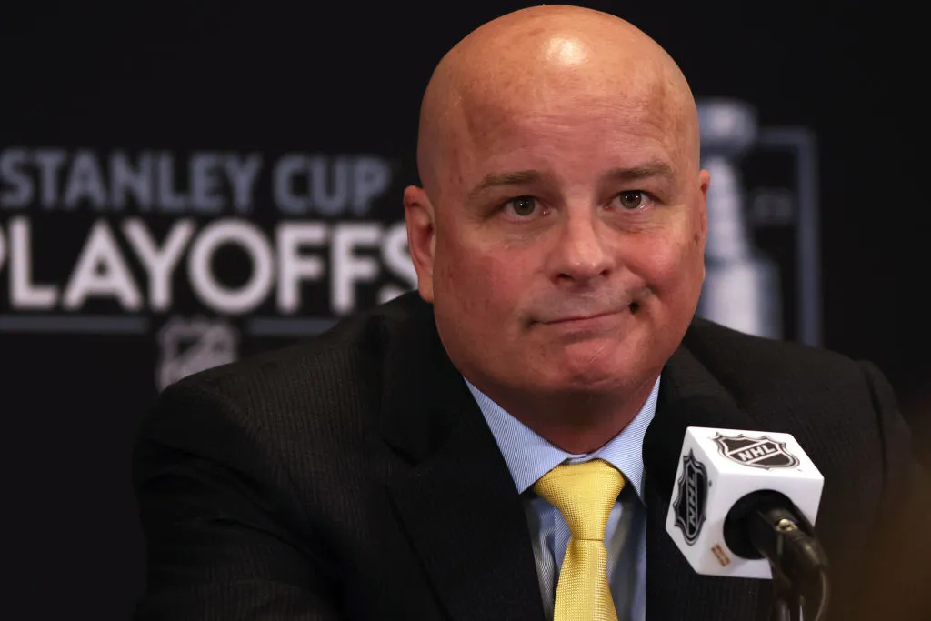 BOSTON, MASSACHUSETTS - APRIL 30: Boston Bruins head coach Jim Montgomery speaks to the media after the Florida Panthers defeat the Bruins 4-3 in overtime of Game Seven of the First Round of the 2023 Stanley Cup Playoffs at TD Garden on April 30, 2023 in Boston, Massachusetts. (Photo by Maddie Meyer/Getty Images)