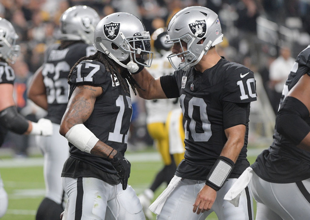 LAS VEGAS, NEVADA - SEPTEMBER 24: Davante Adams #17 of the Las Vegas Raiders celebrates a touchdown with Jimmy Garoppolo #10 during the first quarter in the game against the Pittsburgh Steelers during the first quarter at Allegiant Stadium on September 24, 2023 in Las Vegas, Nevada. (Photo by Sam Morris/Getty Images)