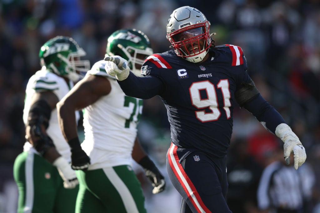 FOXBOROUGH, MASSACHUSETTS - OCTOBER 27: Deatrich Wise Jr. #91 of the New England Patriots reacts after a sack during the third quarter against the New York Jets at Gillette Stadium on October 27, 2024 in Foxborough, Massachusetts. (Photo by Adam Glanzman/Getty Images)