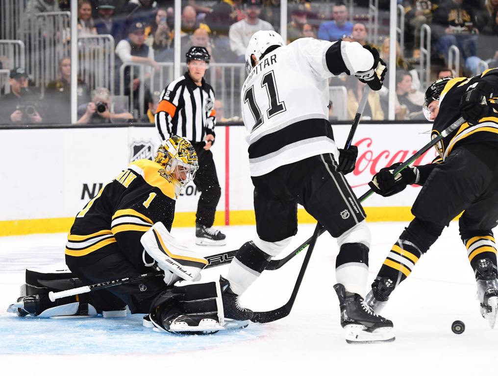 Oct 12, 2024; Boston, Massachusetts, USA; Los Angeles Kings center Anze Kopitar (11) looks for a rebound in front of Boston Bruins goaltender Jeremy Swayman (1) during the second period at TD Garden. Mandatory Credit: Bob DeChiara-Imagn Images