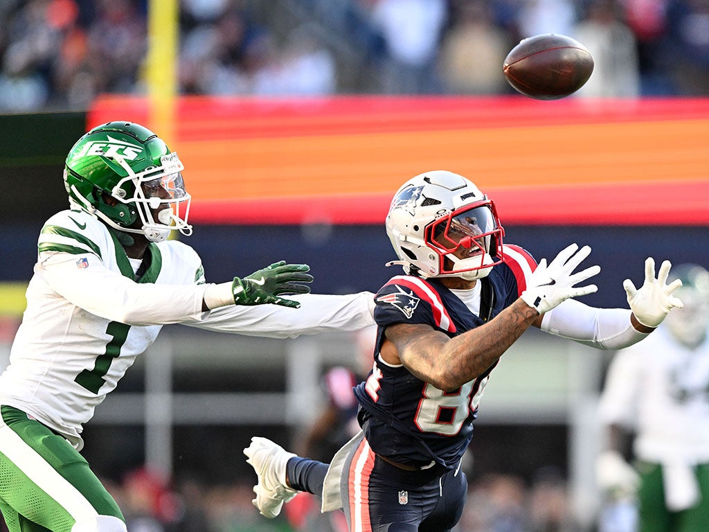 Oct 27, 2024; Foxborough, Massachusetts, USA; New England Patriots wide receiver Kendrick Bourne (84) fails to catch a pass thrown by quarterback Jacoby Brissett (not seen) in front of New York Jets cornerback Sauce Gardner (1) during the second half at Gillette Stadium. Mandatory Credit: Brian Fluharty-Imagn Images