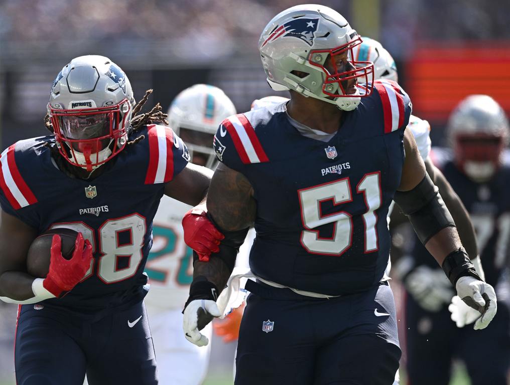 FOXBOROUGH, MASSACHUSETTS - OCTOBER 06: Rhamondre Stevenson #38 of the New England Patriots rushes for a first quarter touchdown against the Miami Dolphins at Gillette Stadium on October 06, 2024 in Foxborough, Massachusetts. (Photo by Jaiden Tripi/Getty Images)