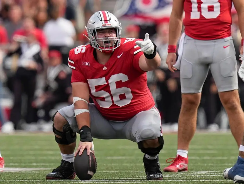 Aug 31, 2024; Columbus, OH, USA; Ohio State Buckeyes offensive lineman Seth McLaughlin (56) motions during the NCAA football game against the Akron Zips at Ohio Stadium. Ohio State won 52-6. (Adam Cairns/Columbus Dispatch/USA Today Network)