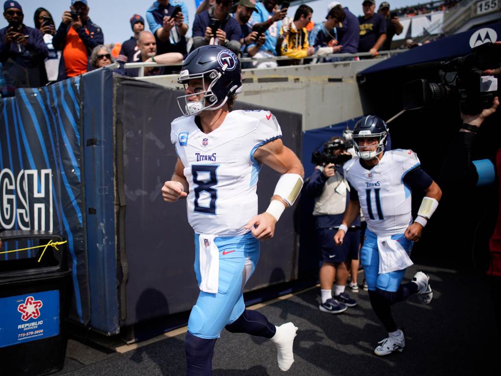 Tennessee Titans quarterback Will Levis (8) and Mason Rudolph (11) hit the field for warmups before the Chicago Bears game at Soldier Field in Chicago, Ill., Sunday, Sept. 8, 2024. (Andrew Nelles/The Tennessean / USA Today Network)