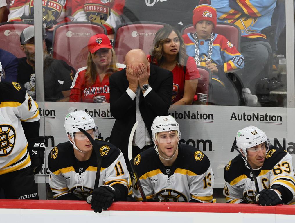 Oct 8, 2024; Sunrise, Florida, USA; Boston Bruins head coach Jim Montgomery reacts from the bench against the Florida Panthers during the third period at Amerant Bank Arena. Mandatory Credit: Sam Navarro-Imagn Images