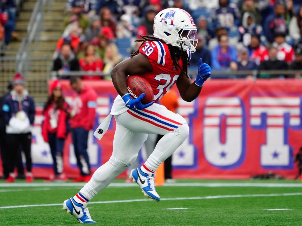 Oct 13, 2024; Foxborough, Massachusetts, USA; New England Patriots running back JaMycal Hasty (39) returns a kick off against the Houston Texans during the second half at Gillette Stadium. Credit: Gregory Fisher-Imagn Images