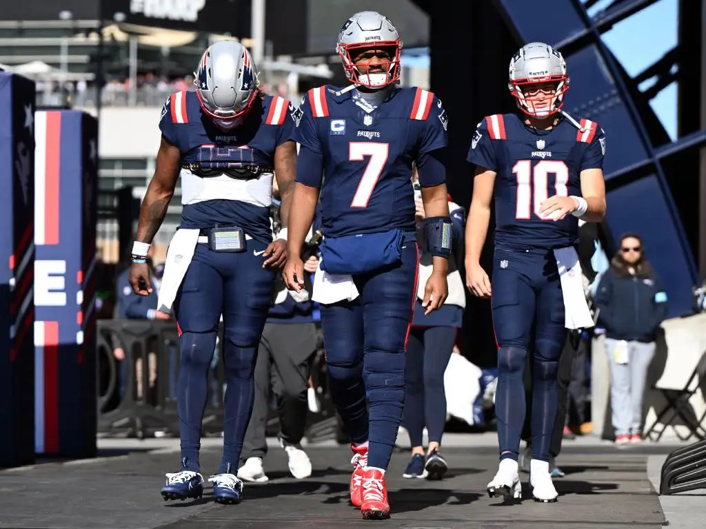 Oct 27, 2024; Foxborough, Massachusetts, USA; New England Patriots quarterback Joe Milton III (19), quarterback Jacoby Brissett (7), and quarterback Drake Maye (10) walk onto the field before a game against the New York Jets at Gillette Stadium. Credit: Brian Fluharty-Imagn Images