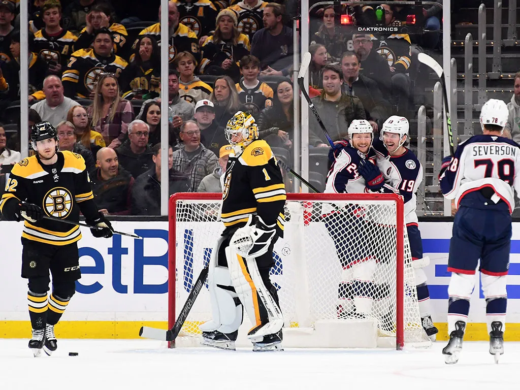 Nov 18, 2024; Boston, Massachusetts, USA; Columbus Blue Jackets right wing Mathieu Olivier (24) reacts with center Adam Fantilli (19) after scoring a goal during the first period against the Boston Bruins at TD Garden. Mandatory Credit: Bob DeChiara-Imagn Images