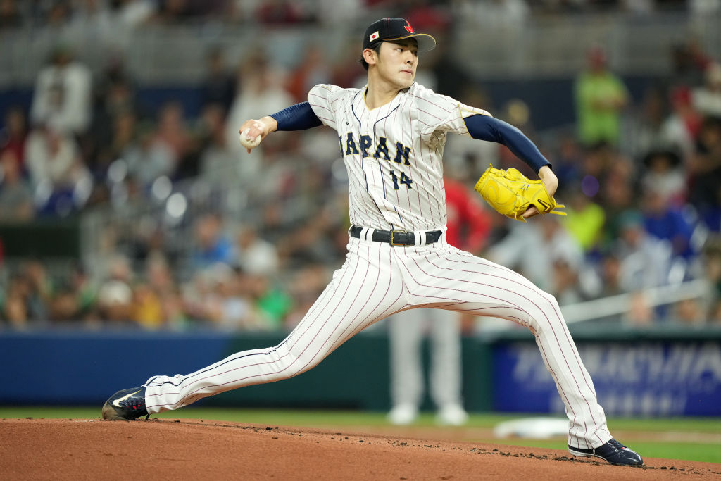 MIAMI, FLORIDA - MARCH 20: Roki Sasaki #14 of Team Japan pitches in the first inning against Team Mexico during the World Baseball Classic Semifinals at loanDepot park on March 20, 2023 in Miami, Florida. (Photo by Eric Espada/Getty Images)