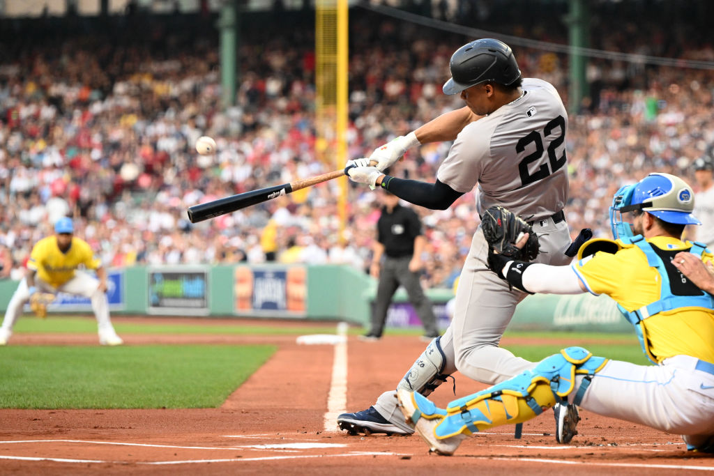 BOSTON, MASSACHUSETTS - JULY 27: Juan Soto #22 of the New York Yankees hits a two-run home run against the Boston Red Sox during the first inning at Fenway Park on July 27, 2024 in Boston, Massachusetts. (Photo by Brian Fluharty/Getty Images)