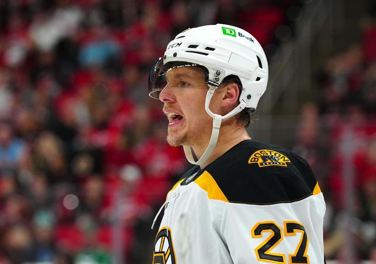 Oct 31, 2024; Raleigh, North Carolina, USA; Boston Bruins defenseman Hampus Lindholm (27) reacts against the Carolina Hurricanes during the third period at Lenovo Center. Mandatory Credit: James Guillory-Imagn Images