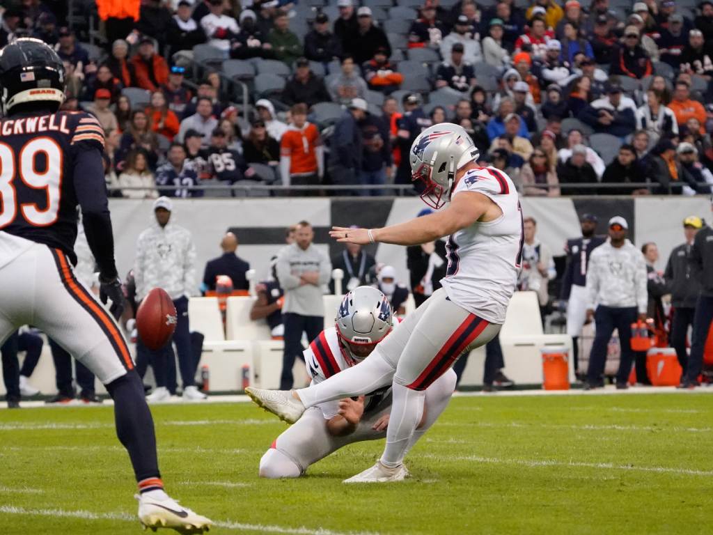 Nov 10, 2024; Chicago, Illinois, USA;New England Patriots place kicker Joey Slye (13) kicks a field goal against the Chicago Bears during the second half at Soldier Field. Credit: David Banks-Imagn Images