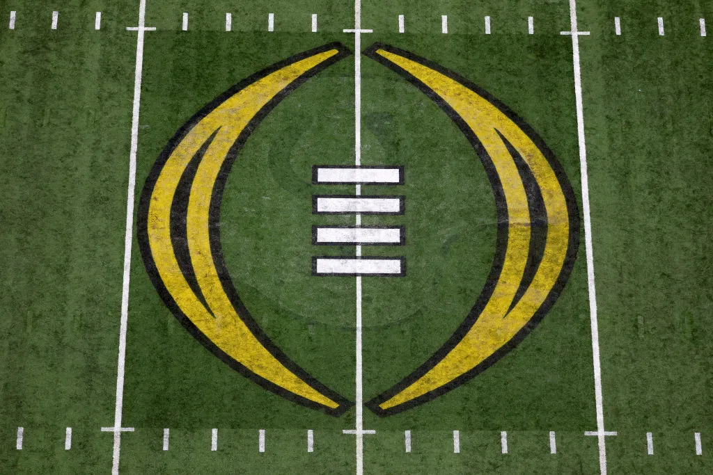 INDIANAPOLIS, INDIANA - JANUARY 10: The 2022 CFP National Championship logo is seen on the field before the game between the Georgia Bulldogs and the Alabama Crimson Tide during the 2022 CFP National Championship Game at Lucas Oil Stadium on January 10, 2022 in Indianapolis, Indiana. (Photo by Dylan Buell/Getty Images)