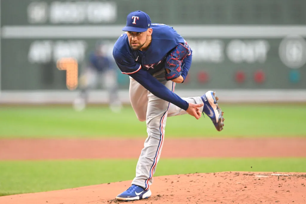 BOSTON, MASSACHUSETTS - JULY 06: Nathan Eovaldi #17 of the Texas Rangers pitches against the Boston Red Sox during the first inning at Fenway Park on July 06, 2023 in Boston, Massachusetts. (Photo by Brian Fluharty/Getty Images)