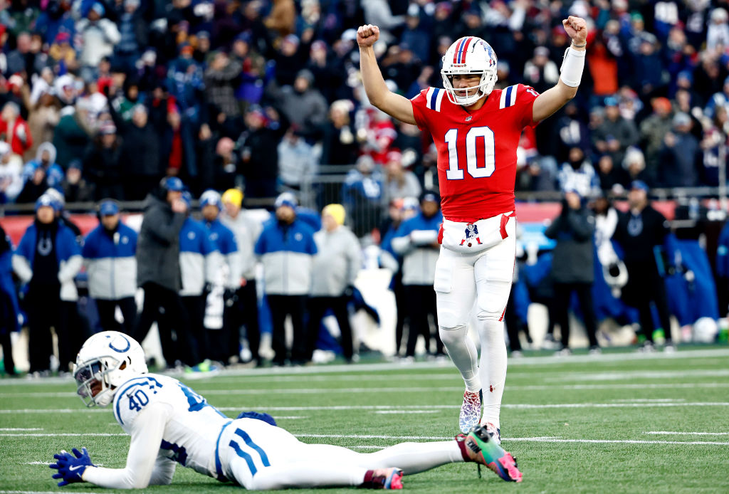 FOXBOROUGH, MASSACHUSETTS - DECEMBER 01: Drake Maye #10 of the New England Patriots reacts after a touchdown in the fourth quarter of a game against the Indianapolis Colts at Gillette Stadium on December 01, 2024 in Foxborough, Massachusetts. (Photo by Winslow Townson/Getty Images)