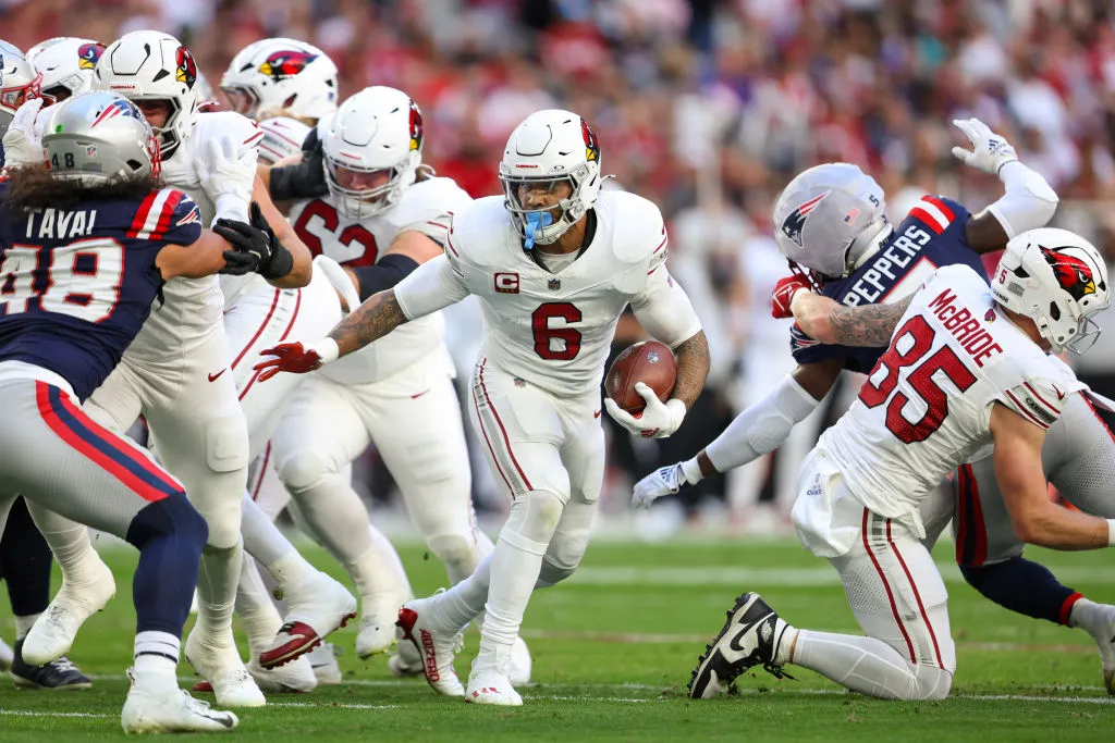 GLENDALE, ARIZONA - DECEMBER 15: James Conner #6 of the Arizona Cardinals carries the ball against the defense of the New England Patriots in the first quarter of the game at State Farm Stadium on December 15, 2024 in Glendale, Arizona. (Photo by Mike Christy/Getty Images)