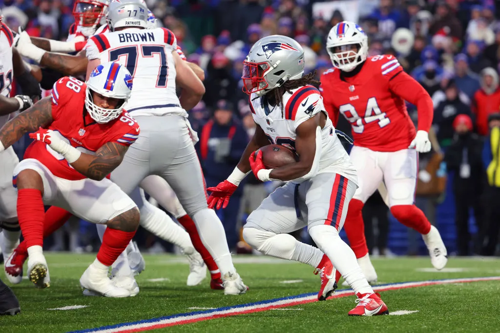 ORCHARD PARK, NEW YORK - DECEMBER 22: Rhamondre Stevenson #38 of the New England Patriots runs the ball against the Buffalo Bills during the first quarter at Highmark Stadium on December 22, 2024 in Orchard Park, New York. (Photo by Timothy T Ludwig/Getty Images)