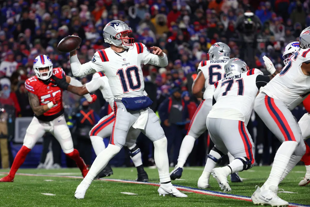 ORCHARD PARK, NEW YORK - DECEMBER 22: Drake Maye #10 of the New England Patriots throws a pass against the Buffalo Bills during the second quarter at Highmark Stadium on December 22, 2024 in Orchard Park, New York. (Photo by Timothy T Ludwig/Getty Images)