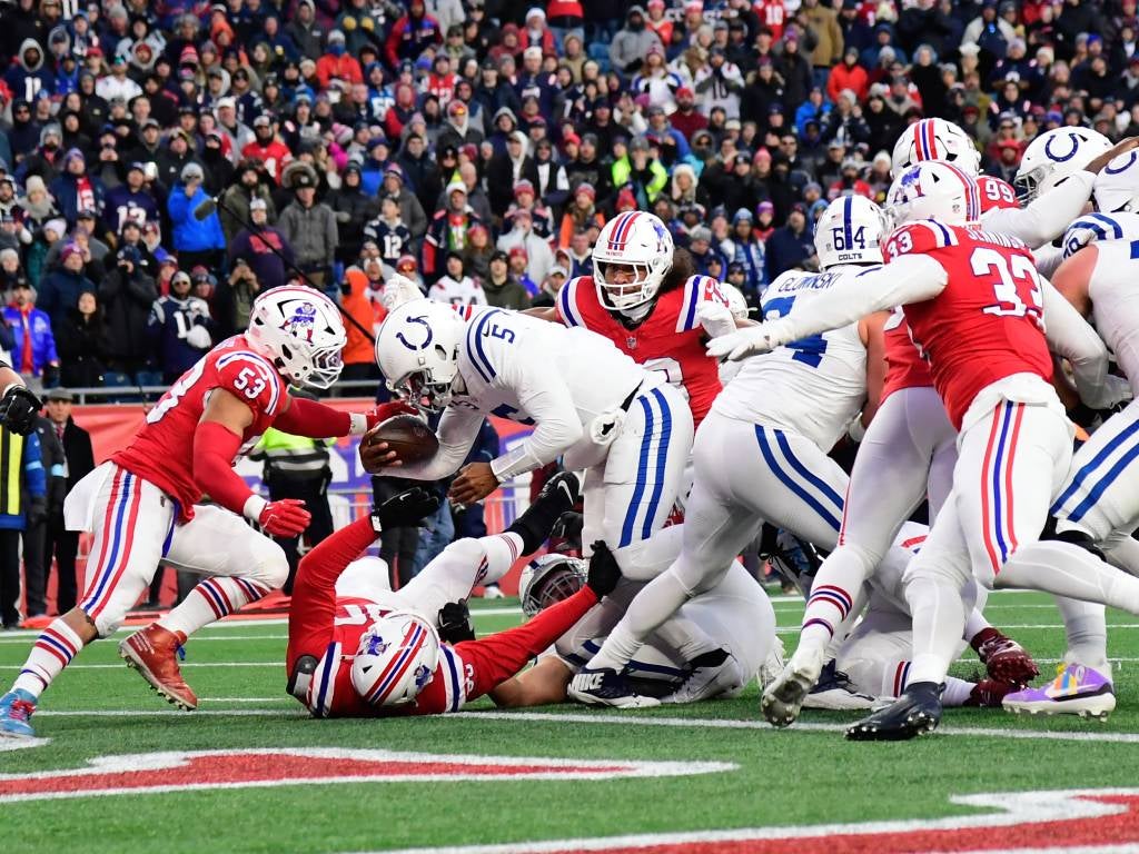 Dec 1, 2024; Foxborough, Massachusetts, USA; Indianapolis Colts quarterback Anthony Richardson (5) scores a two point conversion during the second half against the New England Patriots at Gillette Stadium. Photo Credit: Bob DeChiara-Imagn Images