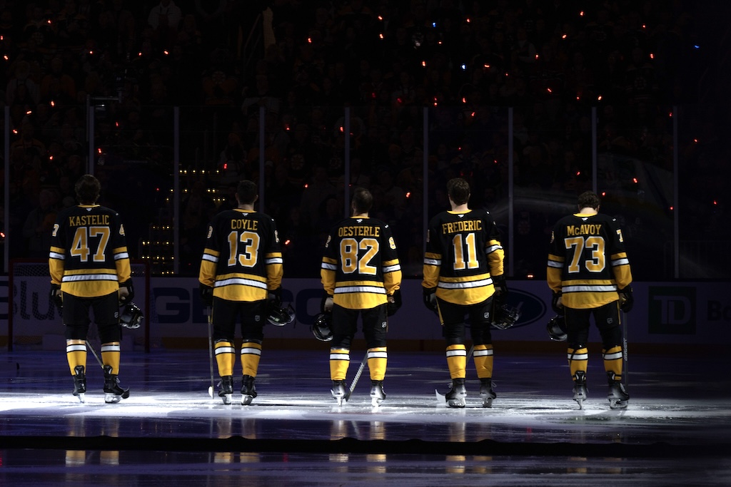 Dec 1, 2024; Boston, Massachusetts, USA; The Boston Bruins starting lineup stands for the national anthem before a game at the TD Garden against the Montreal Canadiens. Mandatory Credit: Natalie Reid-Imagn Images