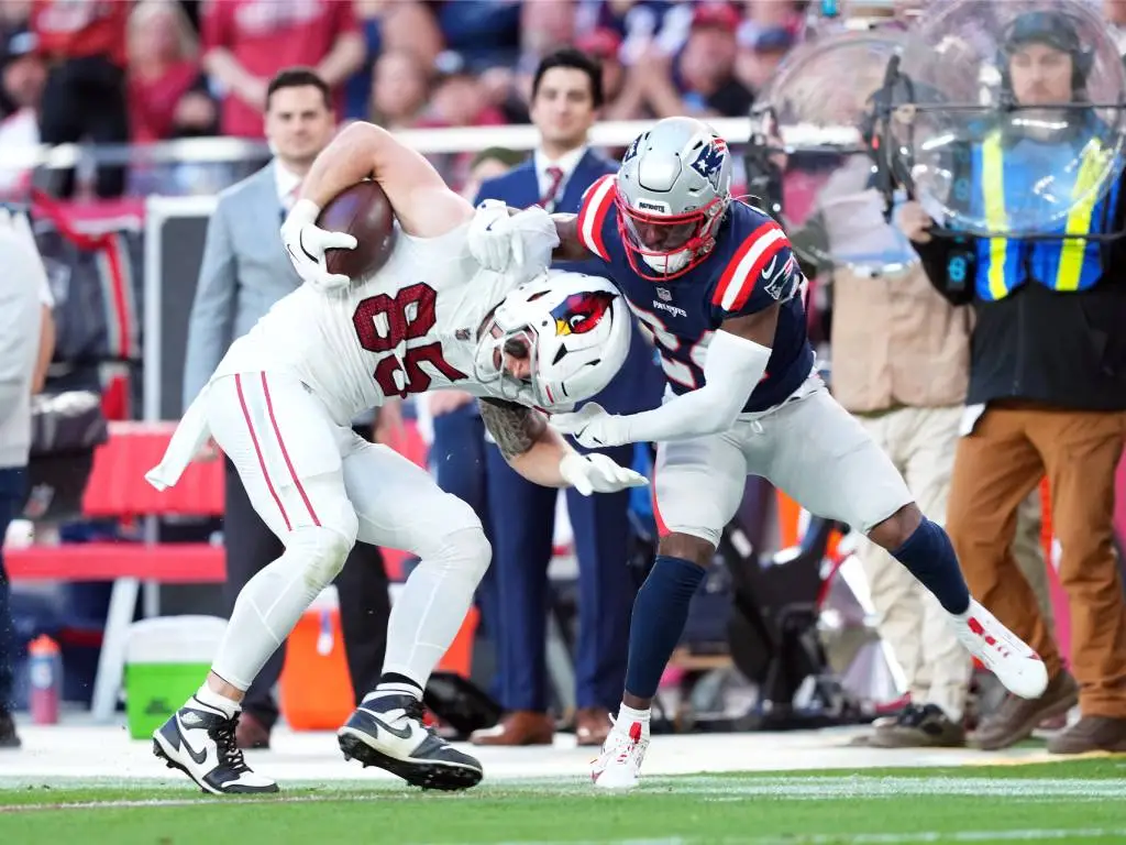 Dec 15, 2024; Glendale, Arizona, USA; Arizona Cardinals tight end Trey McBride (85) runs against New England Patriots safety Dell Pettus (24) during the second half at State Farm Stadium. Mandatory Credit: Joe Camporeale-Imagn Images