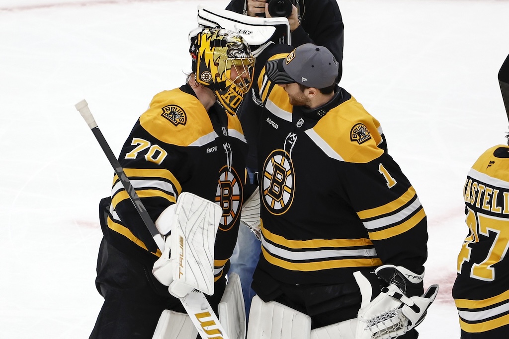 Dec 21, 2024; Boston, Massachusetts, USA; Boston Bruins goaltender Jeremy Swayman (1) congratulates goaltender Joonas Korpisalo (70) after their 3-1 win over the Buffalo Sabres at TD Garden. Mandatory Credit: Winslow Townson-Imagn Images