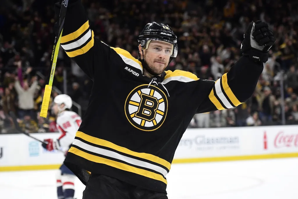 Dec 23, 2024; Boston, Massachusetts, USA; Boston Bruins center Charlie Coyle (13) reacts after scoring a goal during the third period against the Washington Capitals at TD Garden. Mandatory Credit: Bob DeChiara-Imagn Images